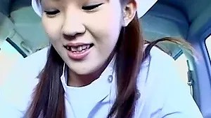 Cute Japanese chick Mari Yamada gives a blowjob in the car