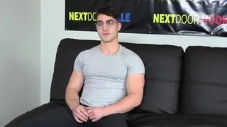 Buffed geek jerking off during casting