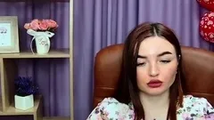 Redhead babe flashes big natural tits