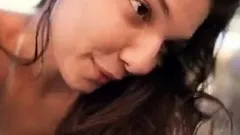 Busty curly brunette with big boobs fucks on couch