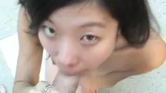 Busty Japanese cutie Kaori Amamiya by the pool gobbling