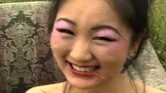 Facialized asian slut swallows