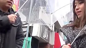 Pretty Asian girl gives a nice blowjob and gets fucked on the sofa