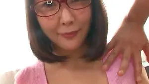 Foxy Japanese babe with glasses gets pleasured with a vibrator