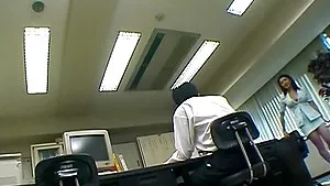 Busty Japanese babe Yui Tokui enjoys riding a dildo in the office