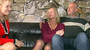 Naughty mature babe loves playing with a hard dick on the couch