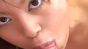 Pretty Japanese girl You Morisawa enjoys sucking a large dick