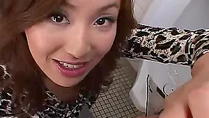 Closeup video of a pretty Asian girl blowing a stranger's cock