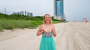 Nice natural tits Dixie loves playing naked on a public beach