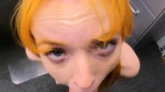 Tiny redhead teen framed by a mall cop