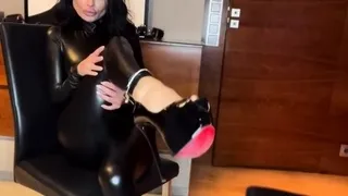 Sexy girl in leather catsuit