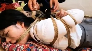 Chinese bondage - Hogtied & rope gagged