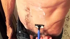 Lean daddy Richard shaves and strokes his cock
