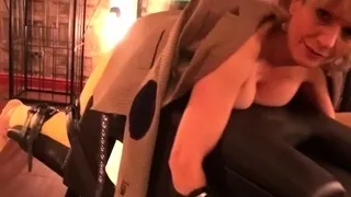 Lady Sonia caged and strips nude in the sex dungeon