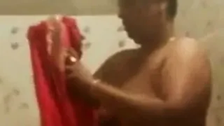Desi Aunt spied on washing her chubby body