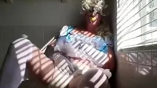 Diapered sissy in pretty blue dress peeing and cumming