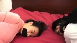 Robbers enter the room to block mother and daughter