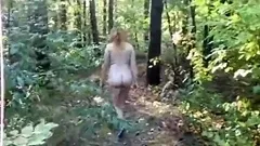 chubby girl with big booty walking nude in forest