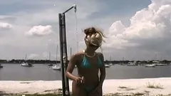 She Strips Out Of Her Suit In A Public Beach Shower