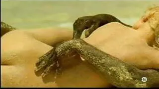 Young blonde white girl with black lover on the beach - Interracial