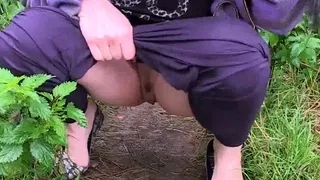 Beauty brunette babe Lucia Love pissing in public