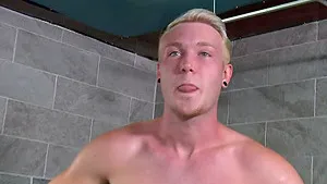 Blonde German gay dude strips down and strokes his huge shaft