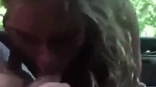 Excited Blonde Blowing In A Car