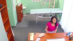 Patient Kirschley Swoon strips and lays on her back to be penetreted