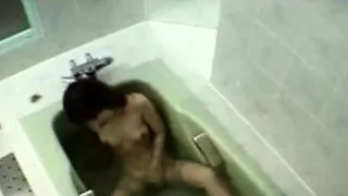 Japanese stepsister masturbates in bath