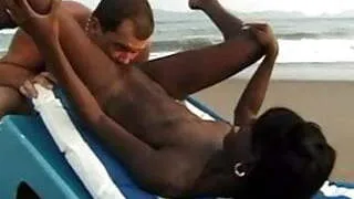 Interracial couple sex on the beach