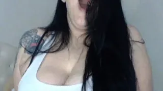 Huge tits brunette in t shirt on cam