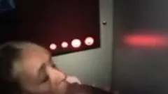 WHITE LADY ON HER KNEES SUCKING AND LICKING BLACK DICK