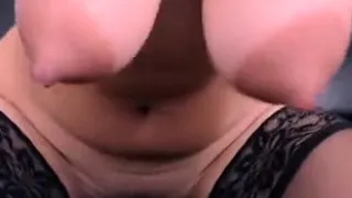 Hot Inez toying her big nipples in close up