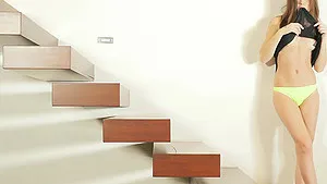 Solo girl Lou strips and teases with her hot body for your pleasure