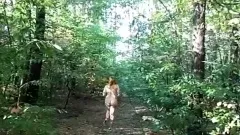 chubby girl with big booty walking nude in forest
