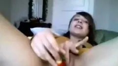 Nasty camgirl stuffs a strawberry in her pussy then eats it