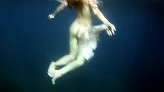 Swimming gracefully naked underwater