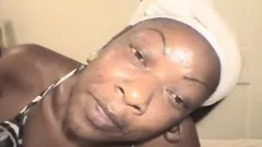 Dark skinned nympho Susan sends her lips pleasing a long white stick