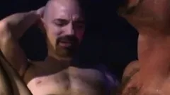 Magnificent gay hunk spreads his legs and enjoys the hot fisting action