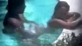 Hot brunette caught fucking in the hotel pool by a peeper