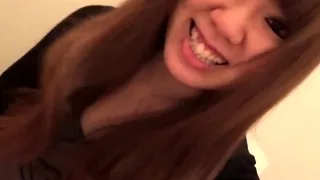 Asian pissing into toilet