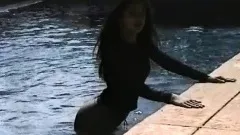 Foxy Joanne Rachel poses out by the pool in the evening sunlight