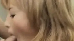 Asian redhead gets felt up while she's giving a blowjob and swallows