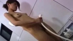 After a sensual blowjob, the cute Asian babe enjoys a relaxing shower