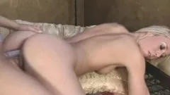 Horny young Sativa Rose has some lesbian fun using a double-sided dildo