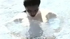 Gorgeous Oriental chick Satomi sensually reveals her sexy body outside