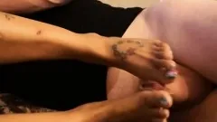 Rod Fontana has a gorgeous black girl pleasing his cock with her feet