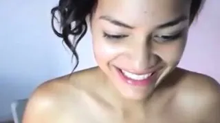 teen ebony plays with toys on webcam