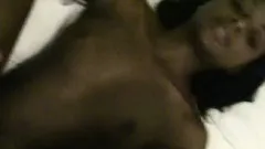 Dark skinned cutie with a perfect ass wildly bounces on a white shaft