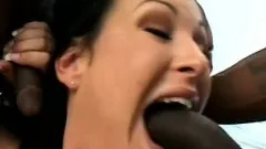 Busty milf plays with a dildo before having fun with two black shafts